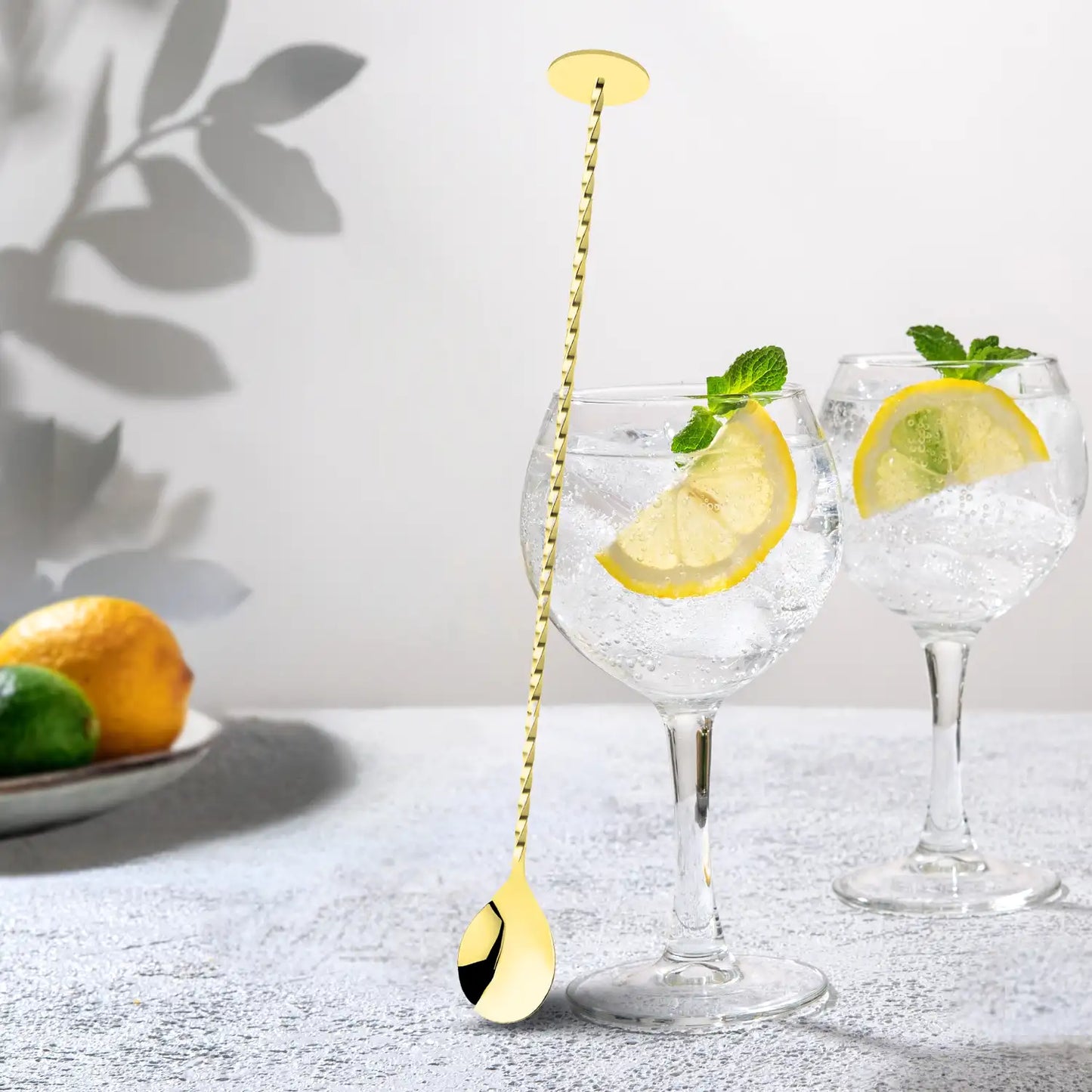 gold bar spoon with flat end for cocktail