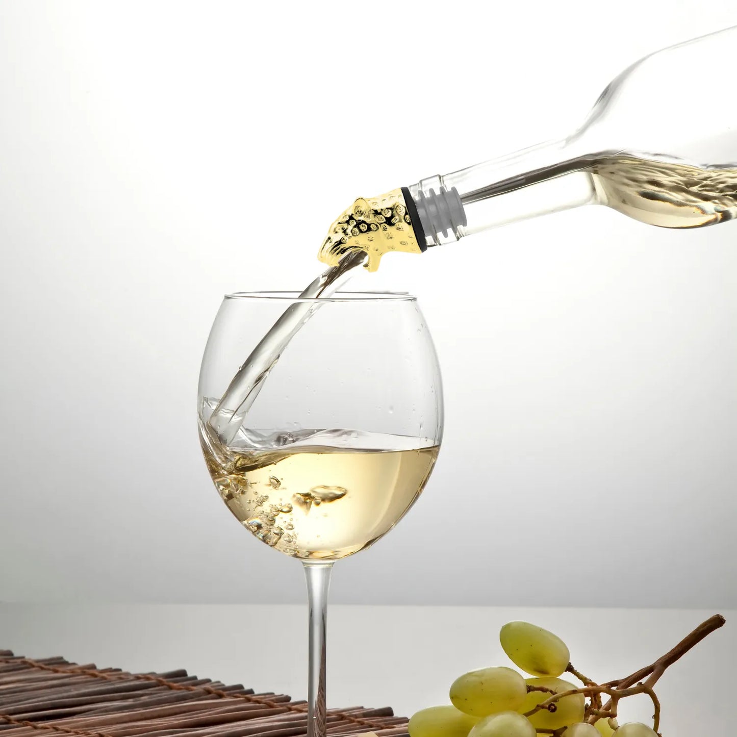 gold leopard pourer in use