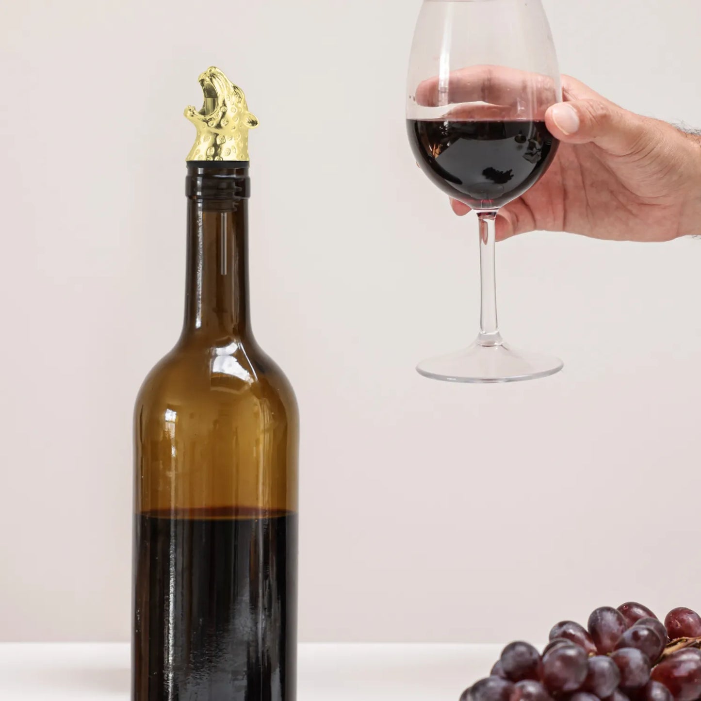 gold leopard pourer on bottle