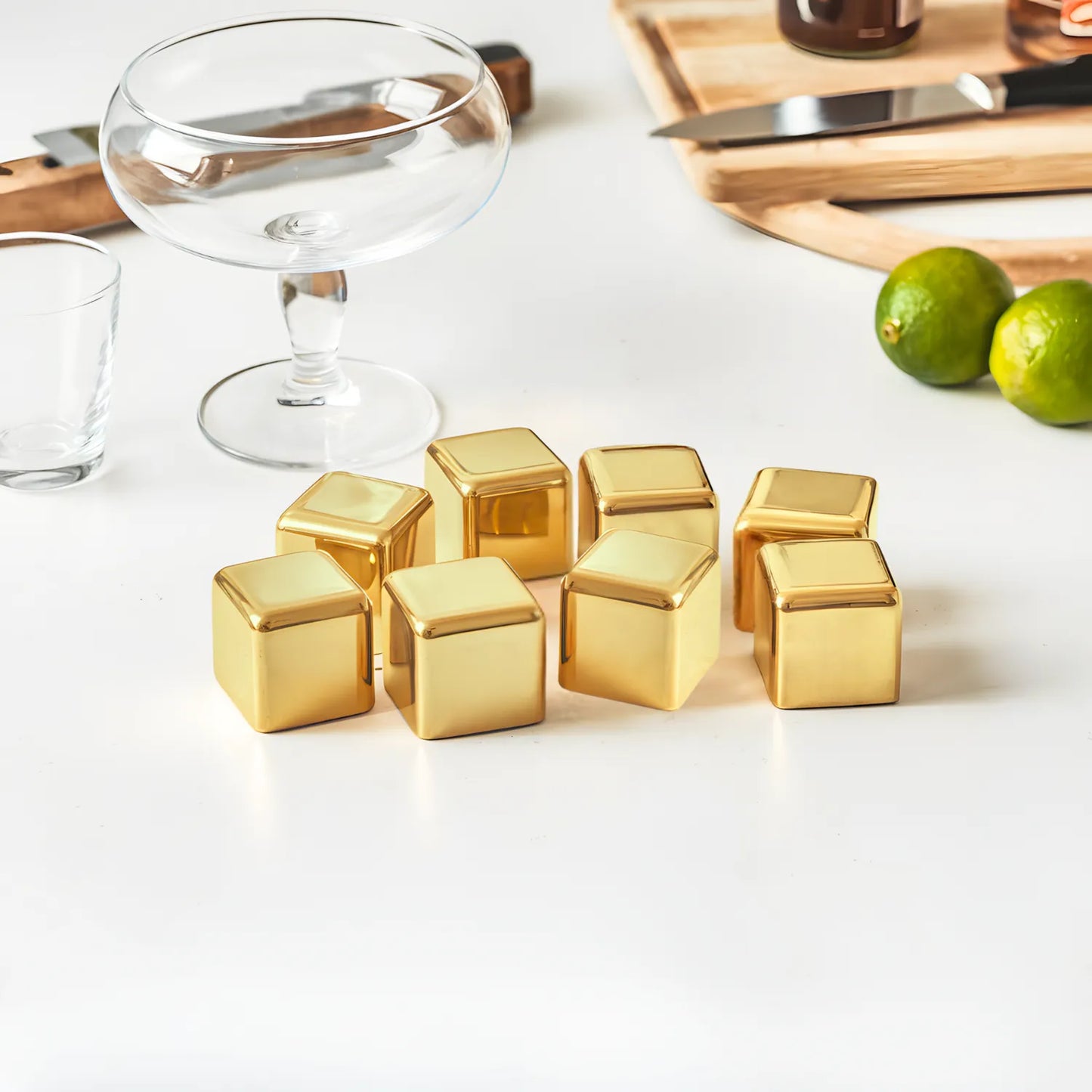 gold stainless steel ice cube set of 8 on table
