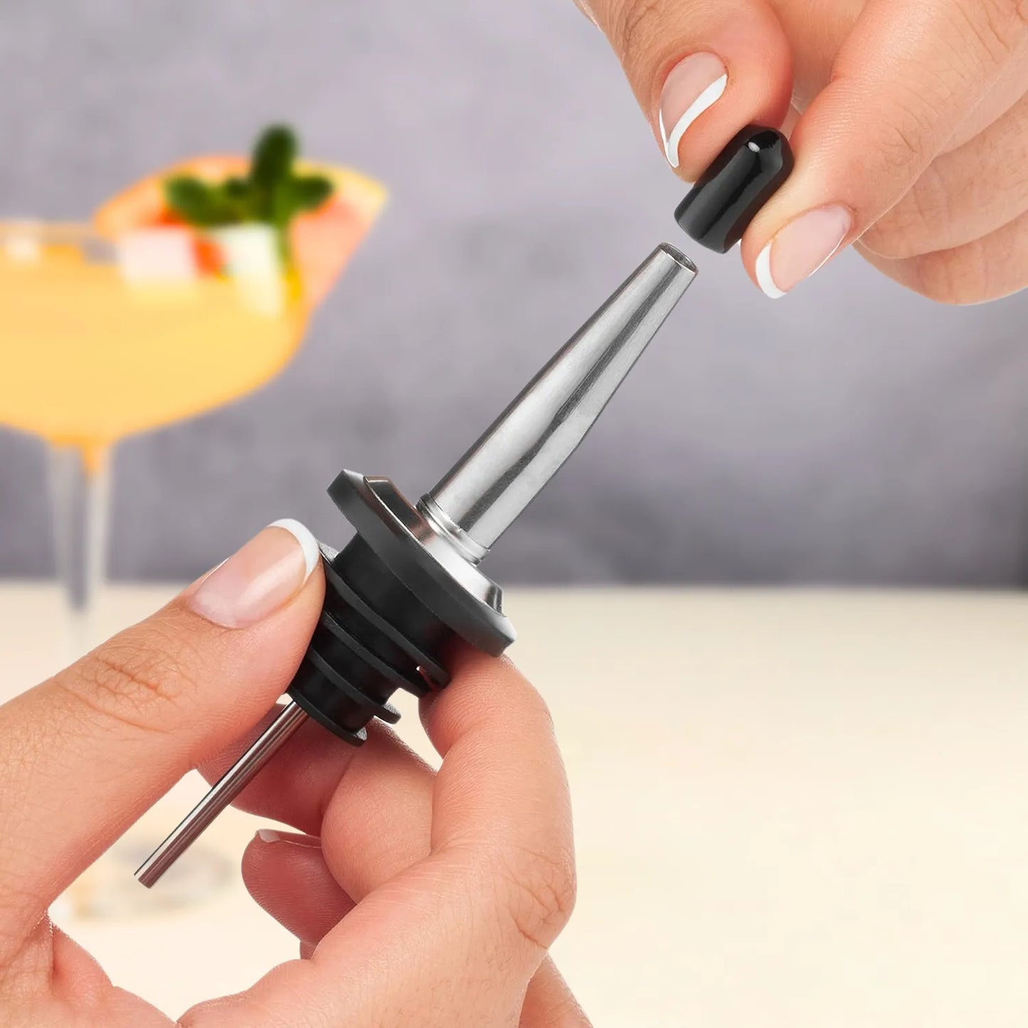 pourer with cap