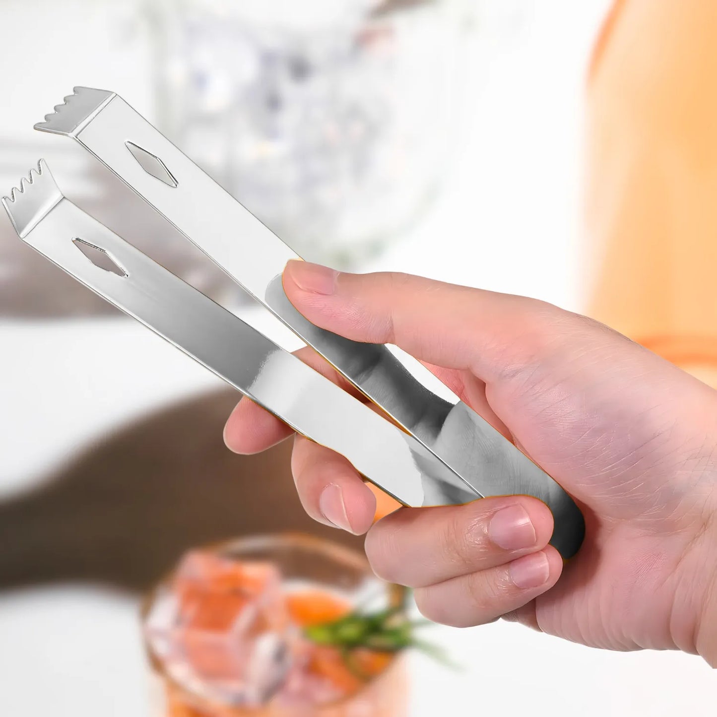 stainless steel ice tongs in use