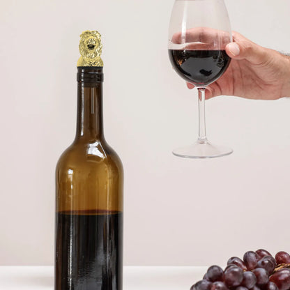 gold lion pourer on bottle
